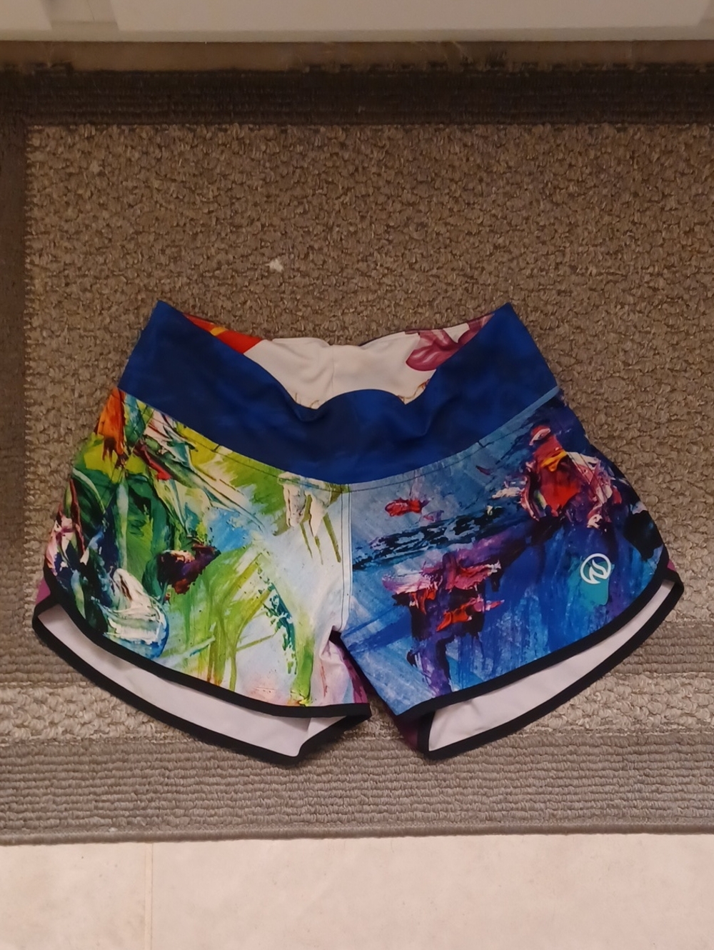 INKnBURN Women's Multicolor Abstract Athletic Shorts with Blue Waistband